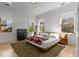 Serene bedroom with a platform bed, warm lighting, and views of the lush greenery outside, creating a relaxing retreat at 1311 Berwick Ne Ave, Atlanta, GA 30306