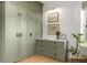Bedroom boasts custom cabinetry and drawers, complemented by stylish decor and natural light at 1311 Berwick Ne Ave, Atlanta, GA 30306