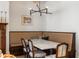 Breakfast nook with banquette seating, marble table, and modern light fixture at 1311 Berwick Ne Ave, Atlanta, GA 30306