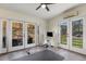 Bright home gym with workout equipment, a ceiling fan, and french doors at 1311 Berwick Ne Ave, Atlanta, GA 30306
