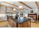 Spacious kitchen with large island, light fixtures, and marble backsplash at 1311 Berwick Ne Ave, Atlanta, GA 30306