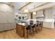 Bright kitchen featuring a large center island with seating and stainless steel appliances at 1311 Berwick Ne Ave, Atlanta, GA 30306
