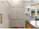Custom cabinets and hardware compliment marble countertops and backsplash at 1311 Berwick Ne Ave, Atlanta, GA 30306