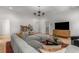 Inviting living room with a plush gray sectional, decorative rug, and sleek entertainment center at 1311 Berwick Ne Ave, Atlanta, GA 30306