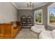 Cozy study with a wooden daybed, built-in bookshelves, and beanbag chairs, creating a relaxing workspace at 1311 Berwick Ne Ave, Atlanta, GA 30306
