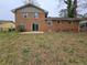 Home's backyard featuring a patio and grass at 1968 Copperfield Cir, Decatur, GA 30035