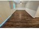 Clean bedroom featuring laminate flooring and fresh, neutral paint at 1968 Copperfield Cir, Decatur, GA 30035