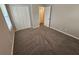 Neutral bedroom with a double door closet at 1968 Copperfield Cir, Decatur, GA 30035