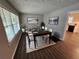 Open dining room with stylish decor, new flooring, and lots of light at 1968 Copperfield Cir, Decatur, GA 30035