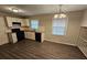 Well-lit kitchen with new flooring and modern appliances at 1968 Copperfield Cir, Decatur, GA 30035