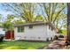 Beautiful backyard with green lawn, mature trees, and well-maintained landscaping at 2322 Poplar Springs Ne Dr, Brookhaven, GA 30319