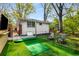 Backyard with putting green and entertainment area perfect for gatherings at 2322 Poplar Springs Ne Dr, Brookhaven, GA 30319