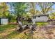 Backyard with outdoor seating around a fire pit, perfect for entertaining at 2322 Poplar Springs Ne Dr, Brookhaven, GA 30319