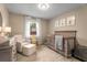 Charming Bedroom with neutral tones, a cozy crib, and comfortable seating for a serene environment at 2322 Poplar Springs Ne Dr, Brookhaven, GA 30319