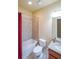 Bathroom with granite countertop, shower and tub with a red curtain at 402 River Vista Dr, Atlanta, GA 30339