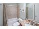 Bathroom featuring a granite countertop, and shower and tub combo with a light beige curtain at 402 River Vista Dr, Atlanta, GA 30339