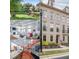 Beautiful collage view showing the townhome exterior, the lawn and pond, kitchen, and living room at 402 River Vista Dr, Atlanta, GA 30339