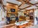 The club's living room features a cozy fireplace, TV, and kitchenette for a relaxed atmosphere at 402 River Vista Dr, Atlanta, GA 30339