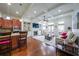 Spacious living room with hardwood floors, fireplace, and access to a private balcony at 402 River Vista Dr, Atlanta, GA 30339