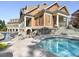 Resort-style pool area with a cool spa and elegant architecture, offering a luxurious outdoor experience at 402 River Vista Dr, Atlanta, GA 30339