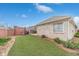 Well-maintained backyard featuring lush green grass and a brick privacy fence at 1170 Livery Cir, Lawrenceville, GA 30046