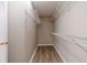 Walk-in closet with built-in shelving for optimal storage and organization at 1170 Livery Cir, Lawrenceville, GA 30046
