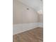 Spacious dining room with wood floors, decorative trim, and a stylish chandelier at 1170 Livery Cir, Lawrenceville, GA 30046