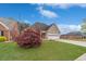 Charming single-story brick home with well-manicured lawn and mature landscaping at 1170 Livery Cir, Lawrenceville, GA 30046