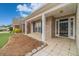 Inviting covered front porch with stone accents and tiled flooring, showcasing curb appeal at 1170 Livery Cir, Lawrenceville, GA 30046