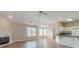 Open living area featuring wood floors, fireplace, and seamless integration with the kitchen at 1170 Livery Cir, Lawrenceville, GA 30046
