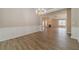 Spacious, open-concept living and dining areas with wood floors and detailed trim work at 1170 Livery Cir, Lawrenceville, GA 30046