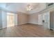 Large main bedroom with vaulted ceilings, fan, and views to the main bathroom and sitting room at 1170 Livery Cir, Lawrenceville, GA 30046