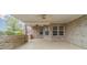 Inviting covered patio featuring brick columns and lots of natural light at 1170 Livery Cir, Lawrenceville, GA 30046