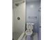 Bathroom features a modern tiled shower and fixtures at 136 Rue Fontaine, Lithonia, GA 30038