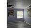 Bedroom with window and modern flooring at 136 Rue Fontaine, Lithonia, GA 30038
