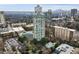 Stunning aerial view of the condo with tennis court, parking, and luxurious outdoor pool at 2870 Pharr Court South Nw # 1209, Atlanta, GA 30305