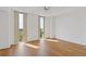 Bright room with hardwood floors and large windows bringing in natural light at 2870 Pharr Court South Nw # 1209, Atlanta, GA 30305