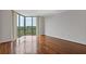 Spacious room featuring hardwood floors and a full wall of windows with amazing views at 2870 Pharr Court South Nw # 1209, Atlanta, GA 30305