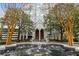 Exterior view of building with water fountain, mature trees and manicured landscaping creating a serene entrance at 2870 Pharr Court South Nw # 1209, Atlanta, GA 30305