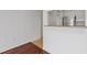 A section of the kitchen with an adjacent view of the living room at 2870 Pharr Court South Nw # 1209, Atlanta, GA 30305