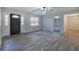 Foyer featuring natural light, hardwood floors, and fresh white trim at 380 Inman Rd, Fayetteville, GA 30215