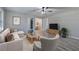 Comfortable living room featuring plush seating and hardwood floors at 380 Inman Rd, Fayetteville, GA 30215