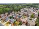 High-angle shot of a suburban neighborhood featuring various architectural styles and lush greenery at 426 Vera Park Pl, Alpharetta, GA 30022