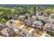 Aerial view showcasing a neighborhood of homes with landscaped yards and mature trees at 426 Vera Park Pl, Alpharetta, GA 30022