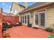 Inviting back deck with outdoor seating and space for planters and entertaining at 426 Vera Park Pl, Alpharetta, GA 30022