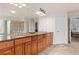An elegant bathroom with a dual vanity, a large mirror, and a tile floor at 426 Vera Park Pl, Alpharetta, GA 30022