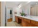 Double vanity bathroom with matching cabinets and an opening leading into the walk-in closet at 426 Vera Park Pl, Alpharetta, GA 30022