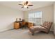 Bedroom with desk, chair, lounger, and a sun-filled window at 426 Vera Park Pl, Alpharetta, GA 30022