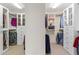 Walk-in closet with organizers and ample storage space for clothes at 426 Vera Park Pl, Alpharetta, GA 30022