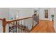 Foyer view showing open floor plan and a staircase with decorative wrought iron at 426 Vera Park Pl, Alpharetta, GA 30022